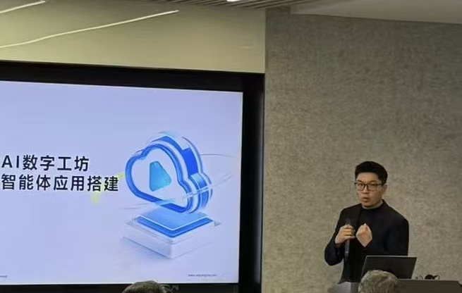 Perry Li working at desk with multiple monitors showing AI architecture diagrams and data visualizations, focused expression, modern workspace